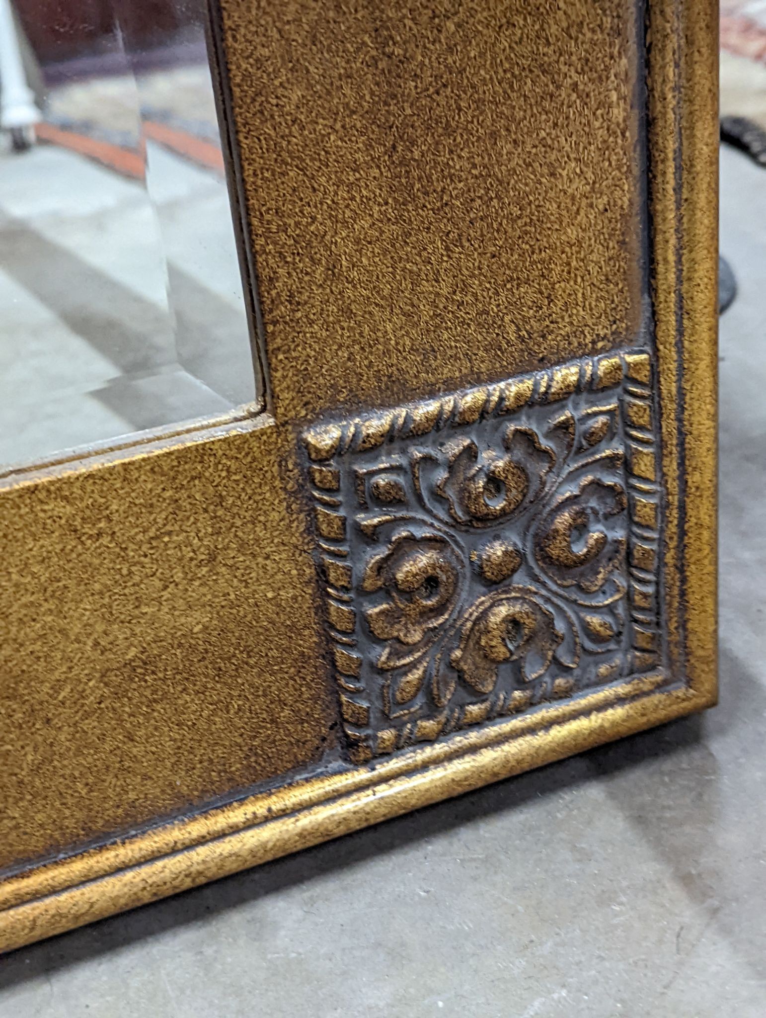 A modern gilt framed painted rectangular overmantel mirror, width 99cm, height 125cm